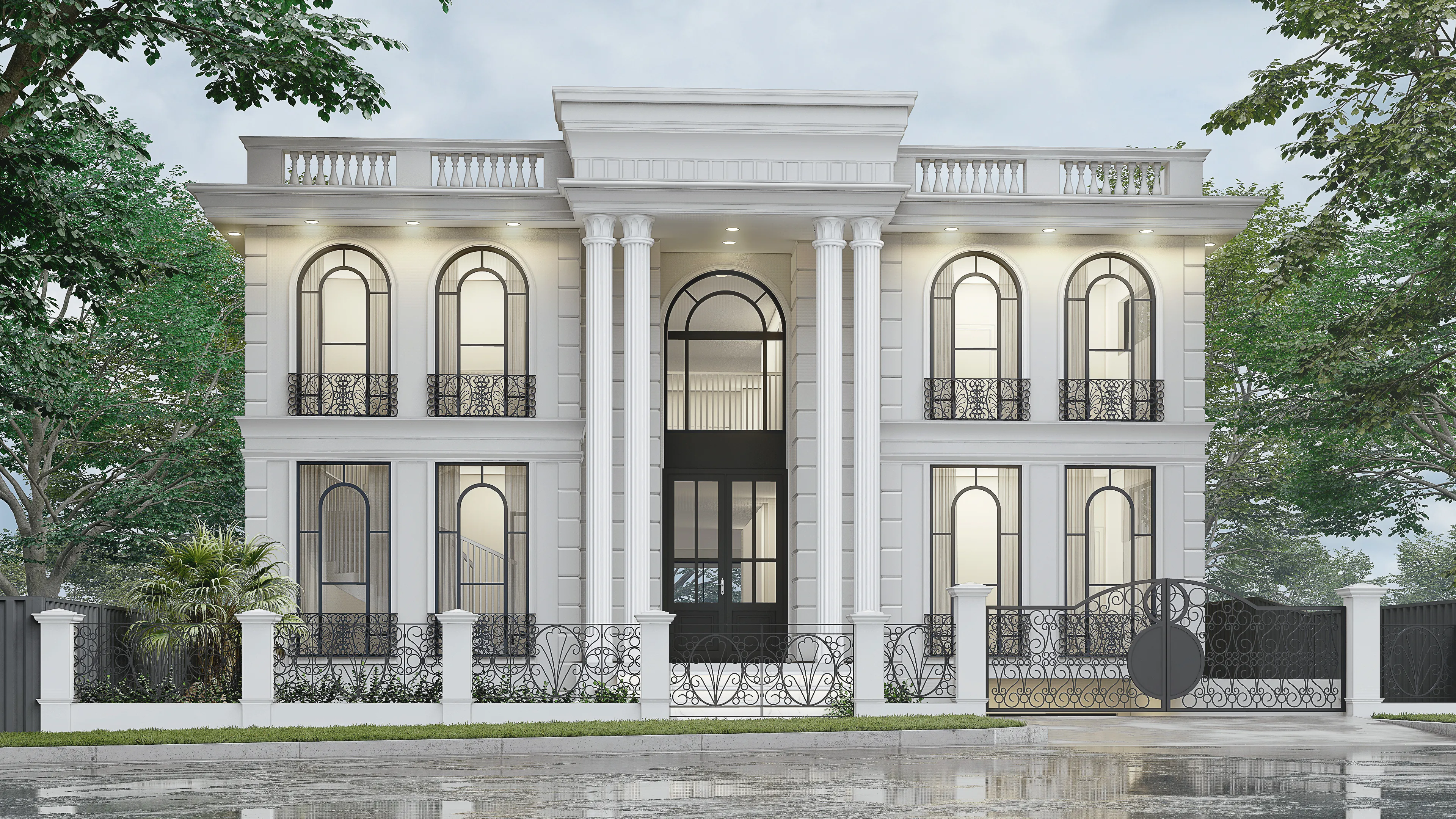 Classical-style residence with arched windows, Corinthian columns and ornate iron balustrades.